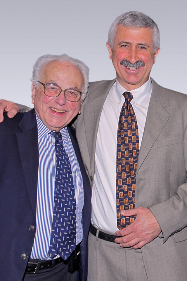 Paul Talalay (esquerda) Jed W. Fahey (direita)