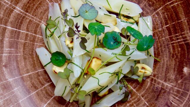 Salsify salad with roasted almond and hazelnut oil dressing