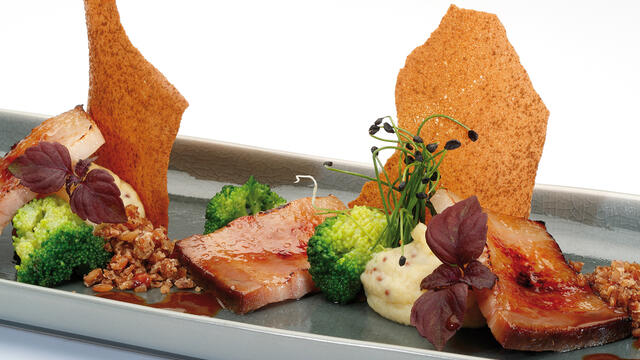 Caramelized Livar pork belly with Limburg mustard and Frisian rye bread