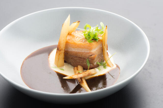 Sour meat from pork belly with cream of parsley root