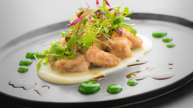 Lamb sweetbreads with cinnamon flowers, celery cream, honey salad and wheatgrass