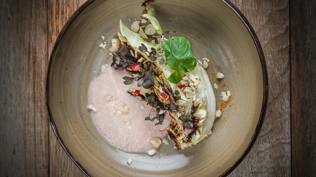 BBQ pointed cabbage steak with radish sauce, cashew net, argan oil and Kyona Mustard Cress