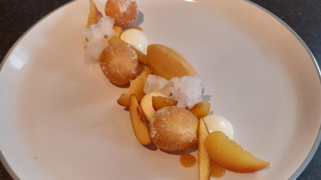 Sechuan Button donuts with peaches, champagne and panna cotta
